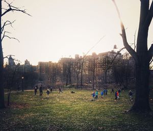 People on grassy field