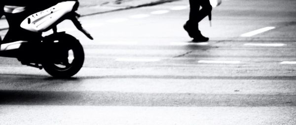 Low section of man on road