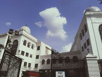 Low angle view of built structure against blue sky