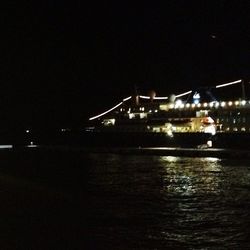 Illuminated bridge over river