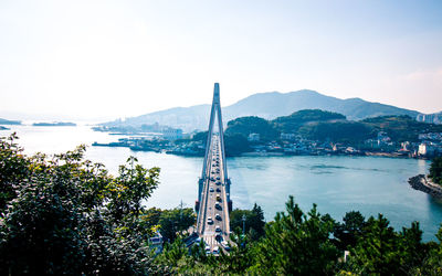 View of bridge over river against sky