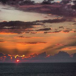 Scenic view of sunset over sea