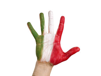 Close-up of human hand against white background