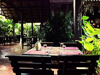 Empty chairs and tables in park