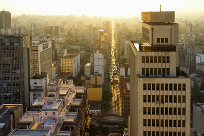 High angle view of buildings in city against sky