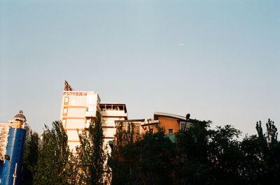 Low angle view of buildings against clear sky