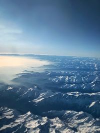 Aerial view of dramatic landscape against sky