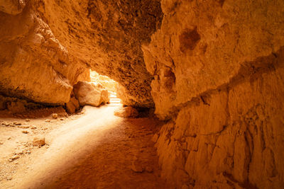 Sunlight streaming through a slot canyon found in bryce canyon national park.