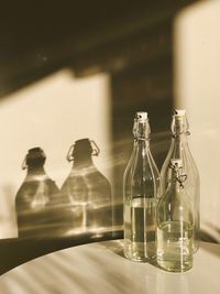 Close-up of glass bottles on table
