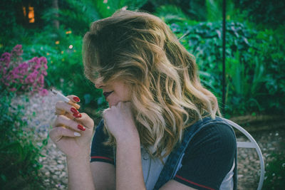 Close-up of woman smoking cigarette