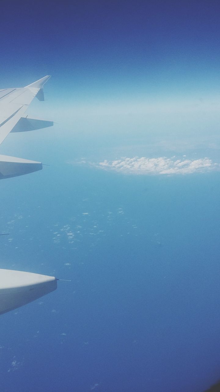 blue, airplane, transportation, sea, aircraft wing, mode of transport, air vehicle, aerial view, scenics, water, beauty in nature, sky, flying, part of, cropped, nature, tranquil scene, tranquility, horizon over water, travel