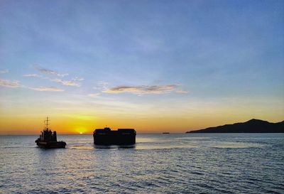 Scenic view of sea against sky during sunset