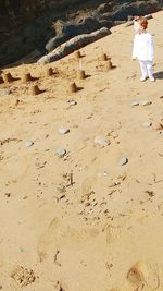 Woman standing on beach