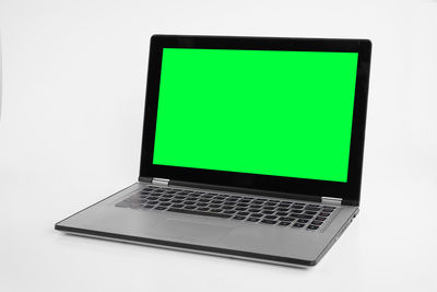 Low angle view of laptop against white background