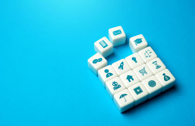 Close-up of calculator on blue background