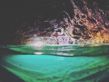 Close-up of sea by swimming pool