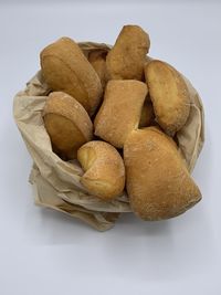 High angle view of bread on white background