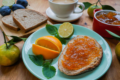 Close-up of breakfast served on table
