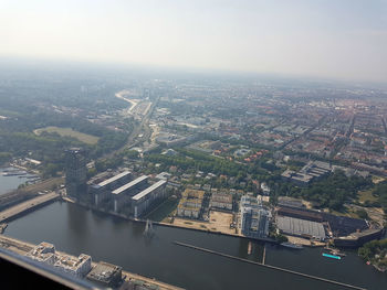 High angle view of river amidst buildings in city