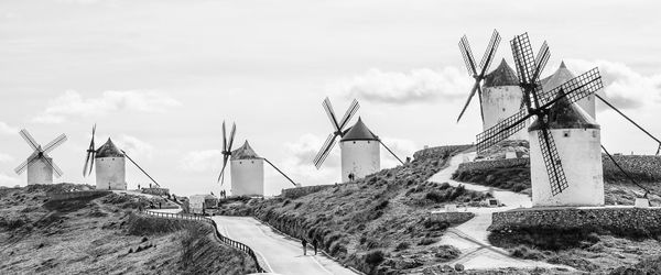 Traditional windmill against sky