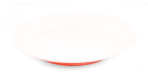 High angle view of empty plate against white background
