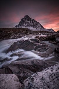 Scenic view of mountain against sky during sunset