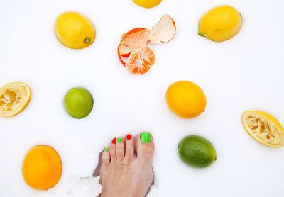 High angle view of fruits on white background