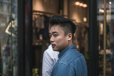 Young man looking away outdoors