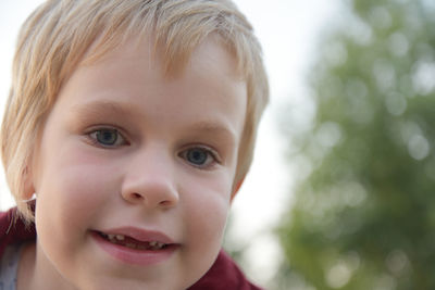 Close-up portrait of a smiling boy