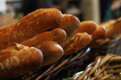 Close-up of breads in wicker baskets