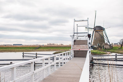 Bridge over river against sky