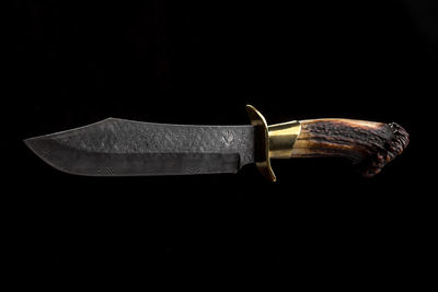 Close-up of glass against black background