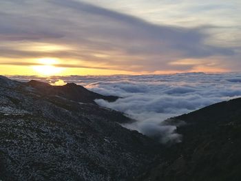 Scenic view of mountains against sky during sunset