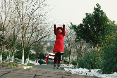 Full length of man jumping in winter