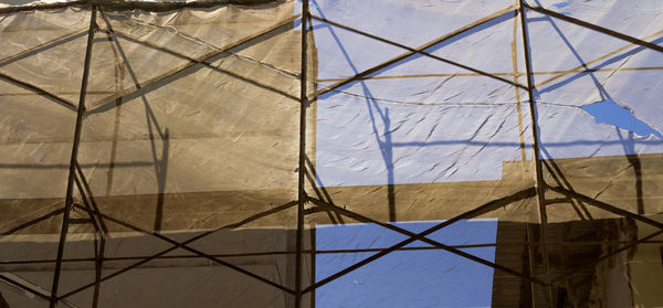 Low angle view of built structure against blue sky