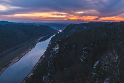 Scenic view of mountains against sky during sunset