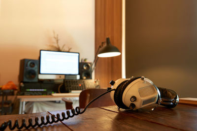 Close-up of headphones on table