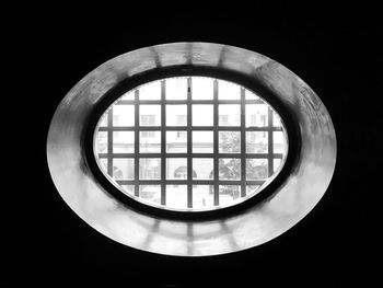 Close-up of window against black background