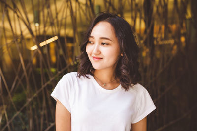 Asian woman street portrait. white blank t shirt mockup