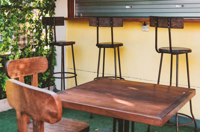 Empty chairs and table in restaurant