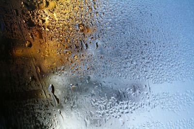 Rain drops on water surface