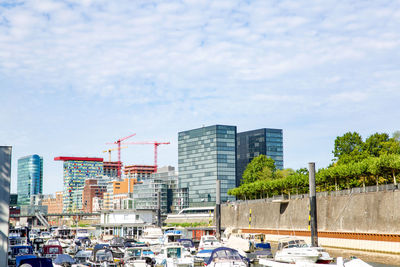 Buildings in city against sky