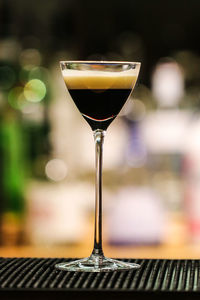 Close-up of beer glass on table