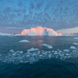 Scenic view of sea against sky during winter