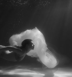 Woman swimming in pool