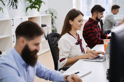 Business colleagues working at office