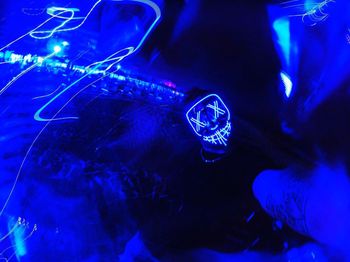 Close-up of illuminated swimming underwater