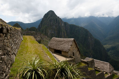 View of old ruins against cloudy sky