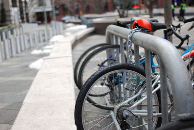 Bicycle parked on street in city