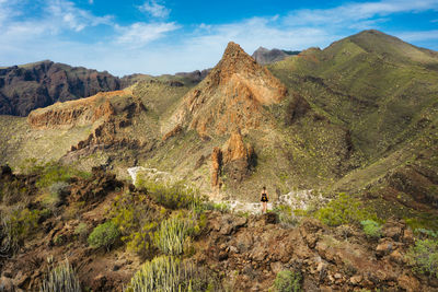 Panoramic view of rocky mountains against sky
